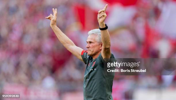 Head coach Jupp Heynckes of FC Bayern Muenchen waves to his fans during a farewell ceremony prior to the Bundesliga match between FC Bayern Muenchen...