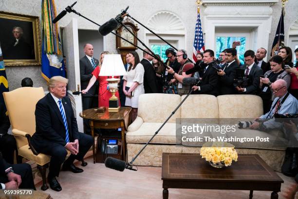 President Donald J. Trump listens to President of the Republic of Uzbekistan Shavkat Mirziyoyev during a meeting in the Oval Office at the White...