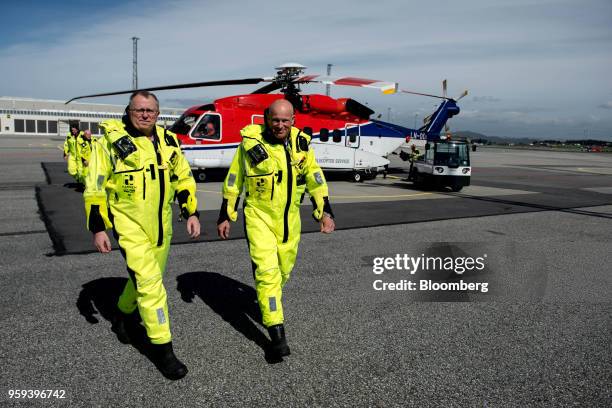 Arne Sigve Nylund, head of development and production in Norway for Equinor ASA, right, and Eldar Saetre, chief executive officer of Equinor ASA,...