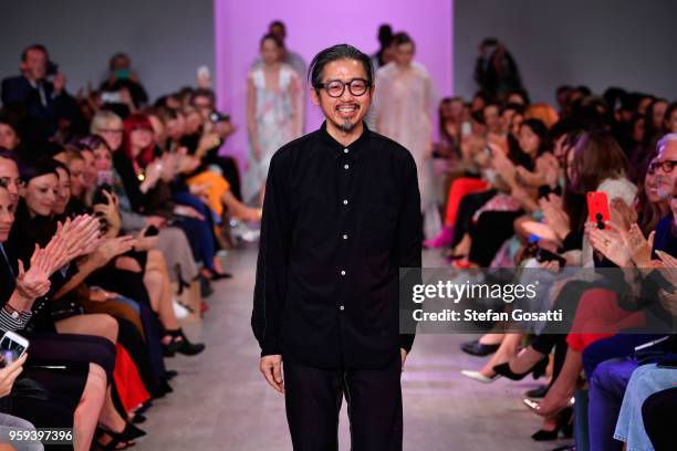 Designer Akira Isogawa thanks the audience following the Akira show at Mercedes-Benz Fashion Week Resort 19 Collections at Carriageworks on May 17,...