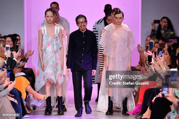 Designer Akira Isogawa thanks the audience following the Akira show at Mercedes-Benz Fashion Week Resort 19 Collections at Carriageworks on May 17,...