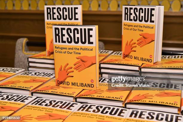 The books "Rescue, Refugees and the Political Crisis of Our Time" by David Miliband on display during "This is Home: A Refugee Story" - New York...