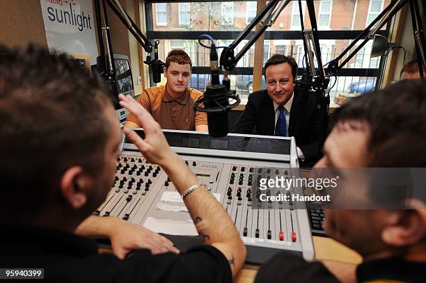 In this handout image supplied by the Conservative Party, Conservative Party Leader David Cameron appears on Radio Sunlight at the Sunlight Centre on...
