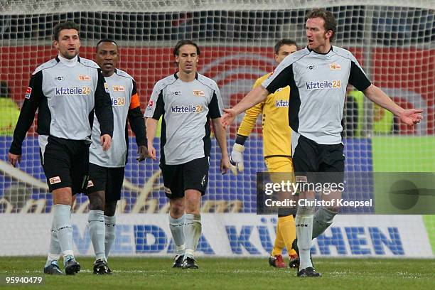 Torsten Mattuschka, Macchambes Younga-Mouhani, Bernd Rauw and Dominic Peitz of Union Berlin look dejected after conceding the first goal from...