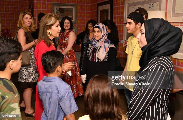 Executive producer HRH Princess Firyal of Jordan greets the Alhalabi family during "This is Home: A Refugee Story" - New York Premier Screening at...