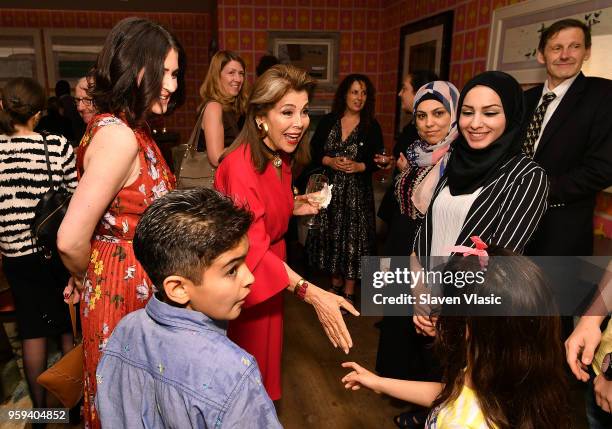 Director Alexandra Shiva and executive producer HRH Princess Firyal of Jordan greet the Alhalabi family during "This is Home: A Refugee Story" - New...