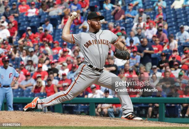 Sam Dyson of the San Francisco Giants throws a pitch during a game against the Philadelphia Phillies at Citizens Bank Park on May 10, 2018 in...