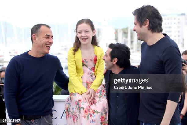 Director Matteo Garrone, Alida Baldari Calabria, Marcello Fonte and Edoardo Pesce attend "Dogman" Photocall during the 71st annual Cannes Film...