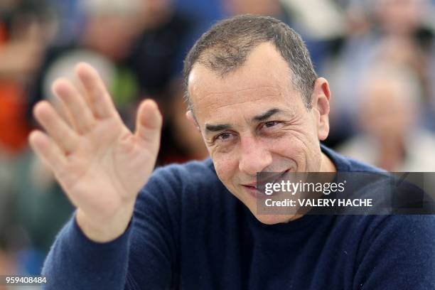 Italian director Matteo Garrone poses on May 17, 2018 during a photocall for the film "Dogman" at the 71st edition of the Cannes Film Festival in...