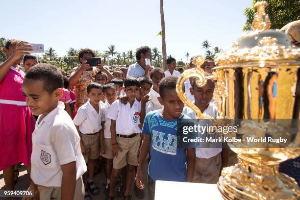 Students from the Kulu Kulu Public School view the Webb Ellis Cup at the Kulu Kulu Public School on May 17, 2018 in Sigatoka, Fiji.