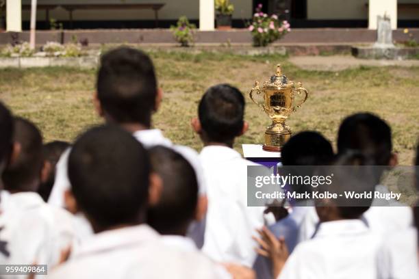 Students from the Kulu Kulu Public School view the Webb Ellis Cup at the Kulu Kulu Public School on May 17, 2018 in Sigatoka, Fiji.