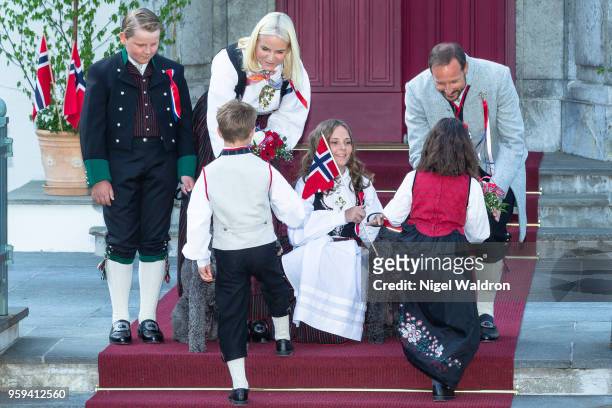 Prince Sverre Magnus of Norway, Princess Mette Marit of Norway, Princess Ingrid Alexandra of Norway and Crown Prince Haakon of Norway speak to the...