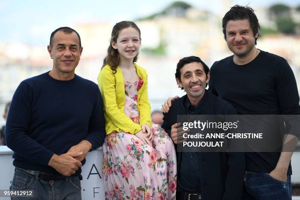 Italian director Matteo Garrone, Italian actress Alida Baldari Calabria, Italian actor Marcello Fonte and Italian actor Edoardo Pesce pose on May 17,...