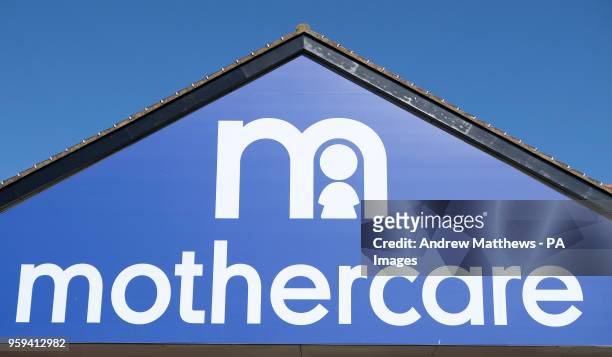 General view of a Mothercare store sign in Basingstoke, Hampshire as it is announced the high street retailer is to close 50 stores and re-hire it's...