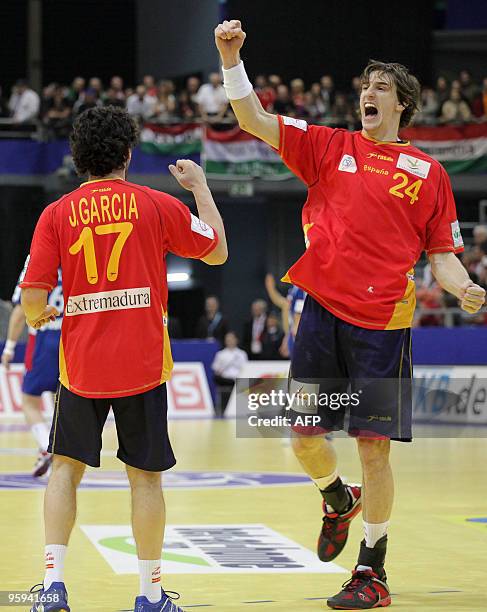 Spain's Viran Morros de Argila and Juan Antonio Garcia celebrate a point during their EHF Handball Euro 2010 Game against France on January 22, 2010...