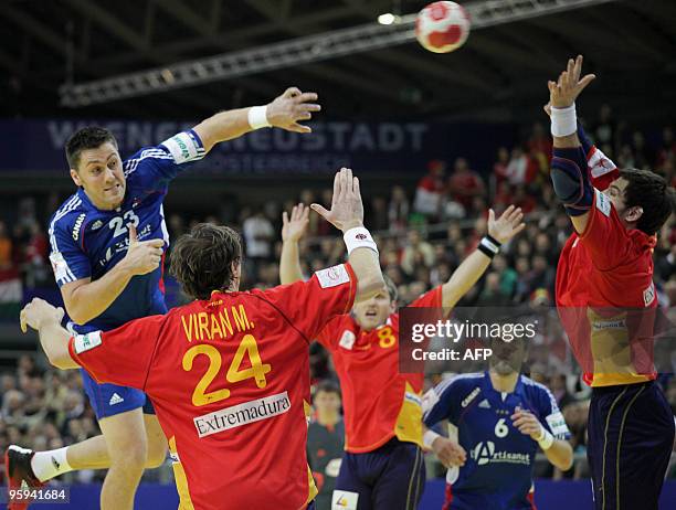 France's BOSQUET Sebastien Bosquet vies against Spain's Viran Morros de Argila TOMAS Victor Thomas and Carlos Prieto during their EHF Handball Euro...