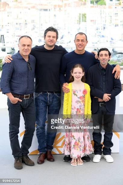 Actors Francesco Acquaroli, Edoardo Pesce, director Matteo Garrone, actors Marcello Fonte and Alida Baldari Calabria attend the photocall for the...