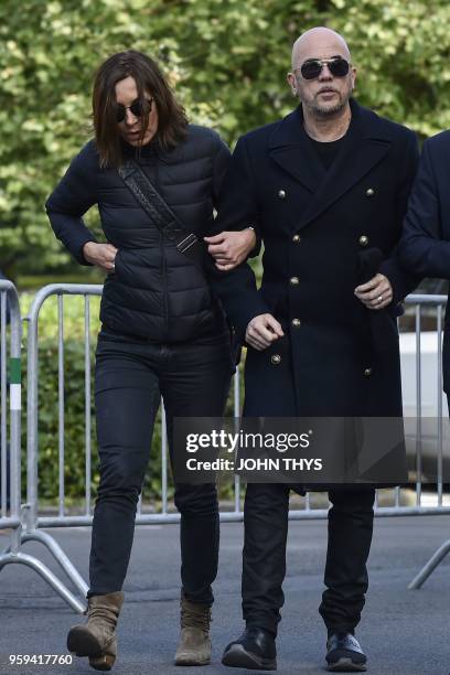 French singers Zazie and Pascal Obispo arrive to attend the funeral ceremony of late Belgian singer Maurane at the Notre-Dame-des-Graces church in...