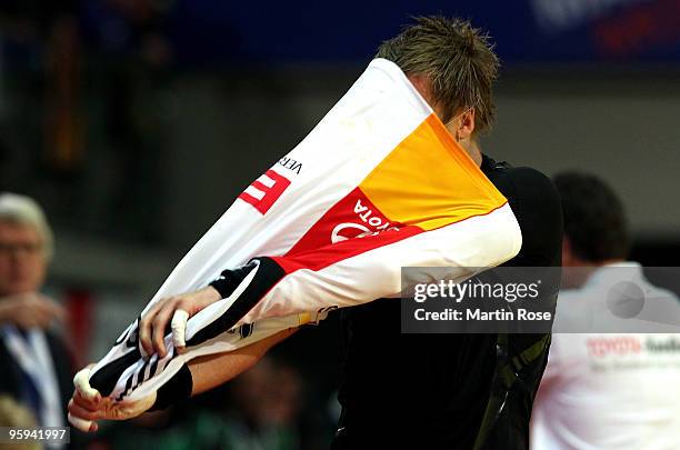 Oliver Roggisch of Germany walks off after he receive the red card during the Men's Handball European Championship Group C match between Germany and...