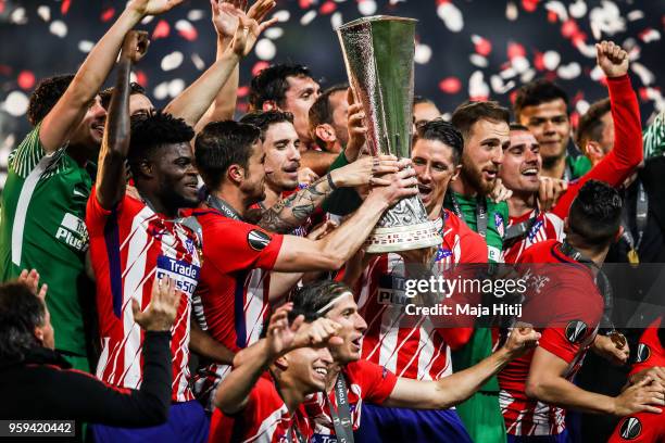 Atletico Madrid players celebrate as they lift The Europa League trophy after the UEFA Europa League Final between Olympique de Marseille and Club...