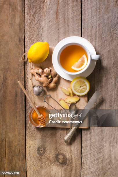 healthy drink honey lemon ginger tea. - infused - fotografias e filmes do acervo