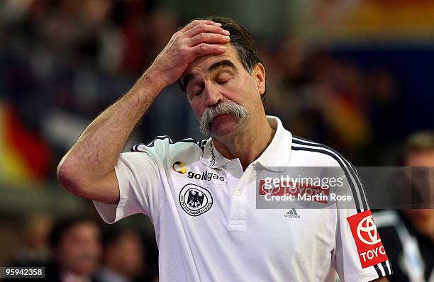 Heiner Brand, head coach of Germany reacts after the Men's Handball European Championship Group C match between Germany and Sweden at the Olympia...