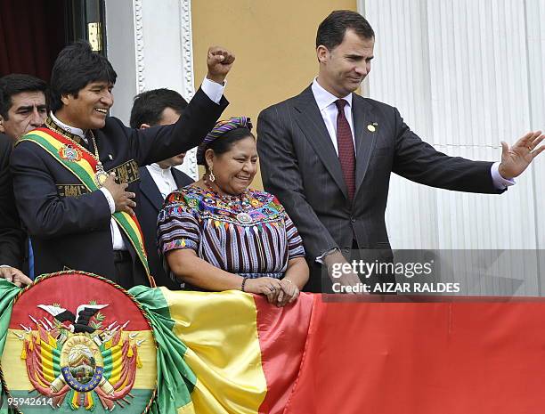 Bolivian President Evo Morales waves to the crowd, accompanied by his guests, Spanish crown Prince Felipe de Borbon and Nobel Peace Prize Rigoberta...