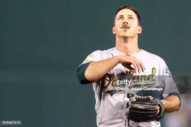 Daniel Mengden of the Oakland Athletics looks on in the first inning of a game against the Boston Red Sox at Fenway Park on May 15, 2018 in Boston,...