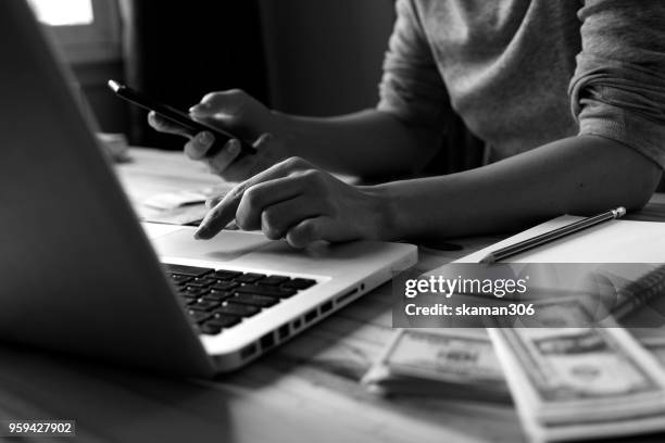 asian business man planing and analysis of online shopping with laptop computer - planing bildbanksfoton och bilder