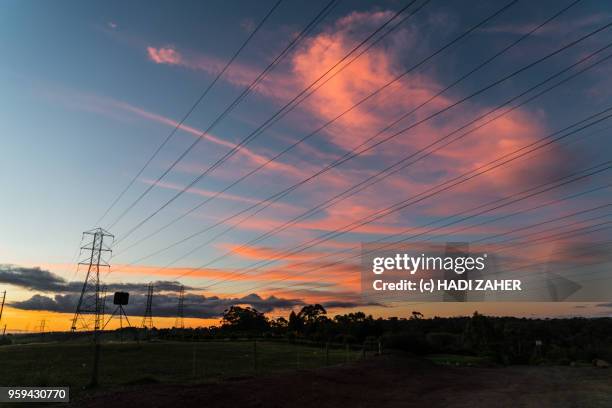 a view of the sunset over suburban melbourne | australia - melbourne australia aerial stock pictures, royalty-free photos & images