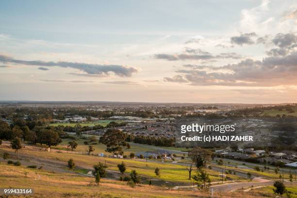 a view of the sunset over suburban melbourne | australia - victoria australia landscape stock pictures, royalty-free photos & images