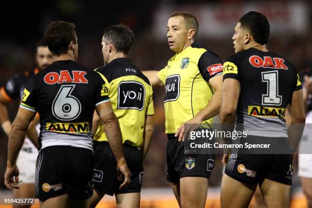 Referee Ben Cummins talks to players during the round 11 NRL match between the Penrith Panthers and the Wests Tigers at Panthers Stadium on May 17,...