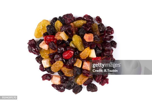 mix variety of dried fruit over white background - fruchtzucker stock-fotos und bilder