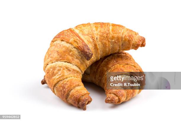 fresh and tasty croissant over white background - croissant white background stockfoto's en -beelden