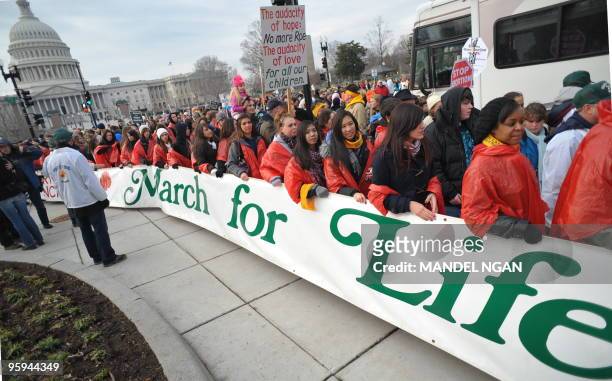 Anti-abortion demonstrators take part in the annual �March for Life� January 22, 2010 in Washington, DC. Gathered to commemorate the 37th anniversary...