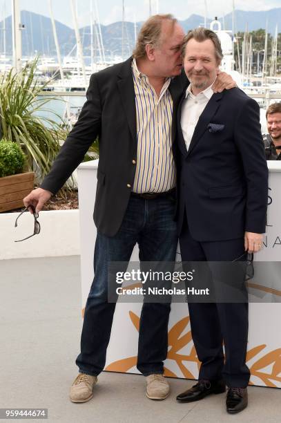 Producer Douglas Urbanski and actor Gary Oldman attend the Rendez-Vous with Gary Oldman Photocall during the 71st annual Cannes Film Festival at...