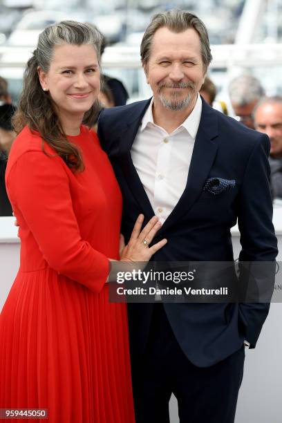 Gary Oldman and wife Gisele Schmidt attends the photocall for Rendez-Vous With Gary Oldman during the 71st annual Cannes Film Festival at Palais des...