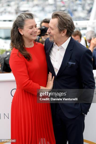 Gary Oldman and wife Gisele Schmidt attends the photocall for Rendez-Vous With Gary Oldman during the 71st annual Cannes Film Festival at Palais des...