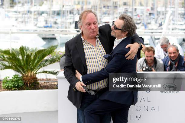 Gary Oldman and guest attend the photocall for Rendez-Vous With Gary Oldman during the 71st annual Cannes Film Festival at Palais des Festivals on...