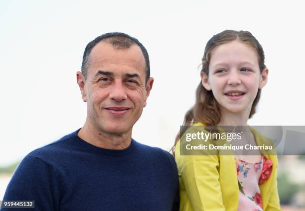 Director Matteo Garrone and Actress Alida Baldari Calabria attend the "Dogman" Photocall during the 71st annual Cannes Film Festival at Palais des...