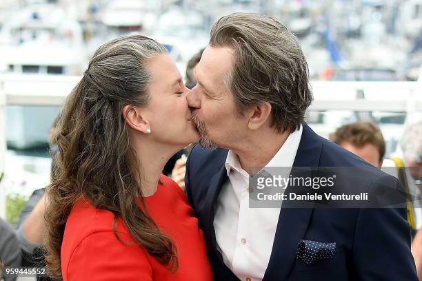 Gary Oldman and wife Gisele Schmidt attends the photocall for Rendez-Vous With Gary Oldman during the 71st annual Cannes Film Festival at Palais des...