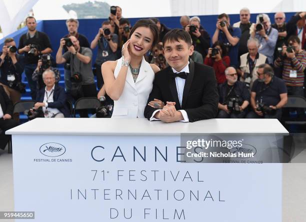 Kazakh film director Adilkhan Yerzhanov and Kazakh actress Dinara Baktybayeva attend the photocall for the "The Gentle Indifference Of The Word"...