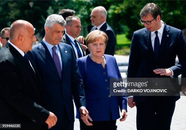 Serbian President Aleksander Vucic speaks with German Chancellor Angela Merkel, next to Bulgarian Prime Minister Boyko Borisov and and Kosovan...