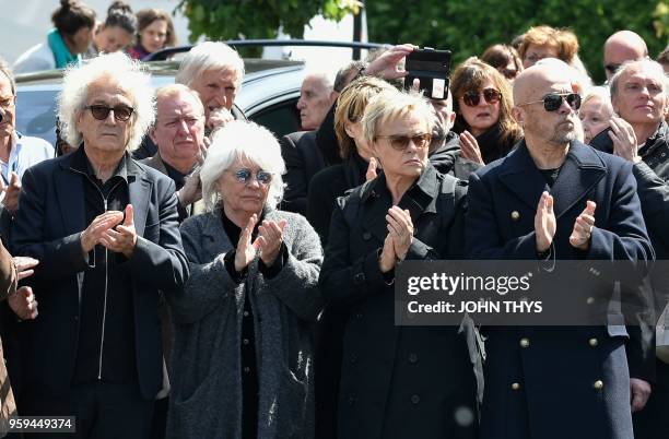 Canadian songwriter Luc Plamondon, French singer Catherine Lara, French humourist Muriel Robin, and French singer Pascal Obispo attend the funeral...