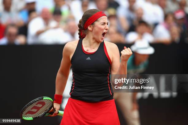 Jelena Ostapenko of Latvia celebrates victory in her singles match against Johanna Konta of Great Britain during day four of the Internazionali BNL...