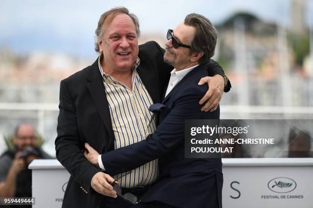 British actor Gary Oldman and US producer Douglas Urbanski pose on May 17, 2018 during a "Rendez-Vous with Gary Oldman" at the 71st edition of the...