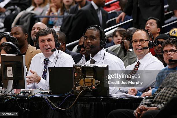 Broadcasters Kevin McHale, Chris Webber and Ernie Johnson share a laugh during the game between the Atlanta Hawks and the Cleveland Cavaliers on...