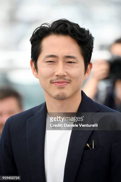 Actor Steven Yeun attends the photocall for the "Burning" during the 71st annual Cannes Film Festival at Palais des Festivals on May 17, 2018 in...