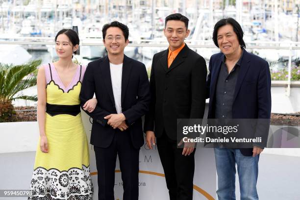 Actors Jong-seo Jeon, Steven Yeun, Ah-in Yoo and director Lee Chang-dong attend the photocall for the "Burning" during the 71st annual Cannes Film...