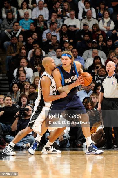 Dirk Nowitzki of the Dallas Mavericks posts up against Richard Jefferson of the San Antonio Spurs during the game on January 8, 2010 at the AT&T...